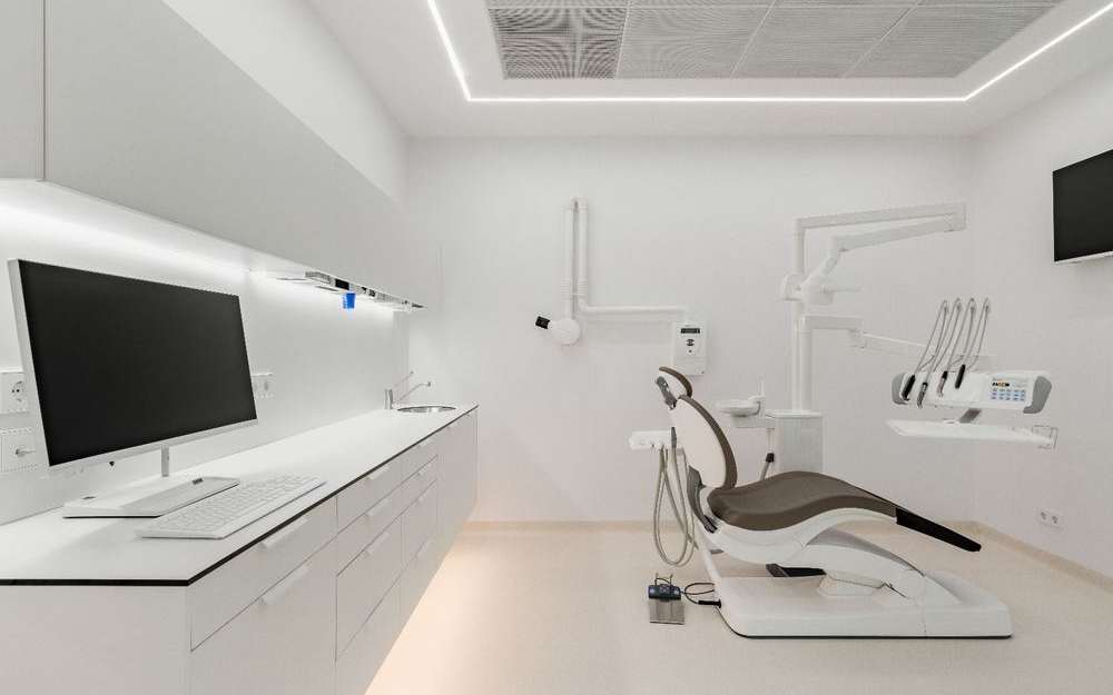 Gabinete dental equipado con sillón y equipo de última generación